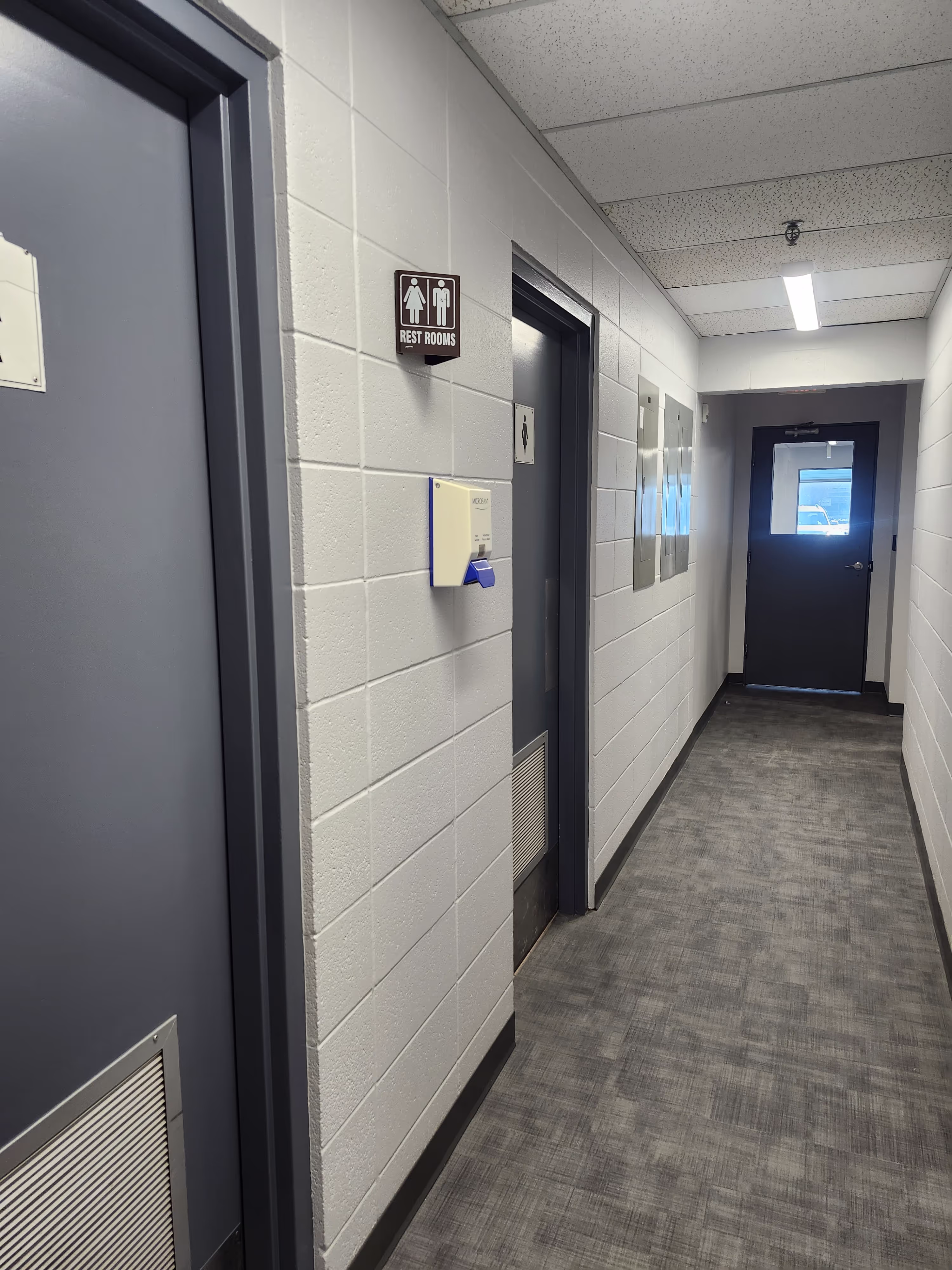 Curtiss-Wright Facility project: curtis wright bathroom hallway